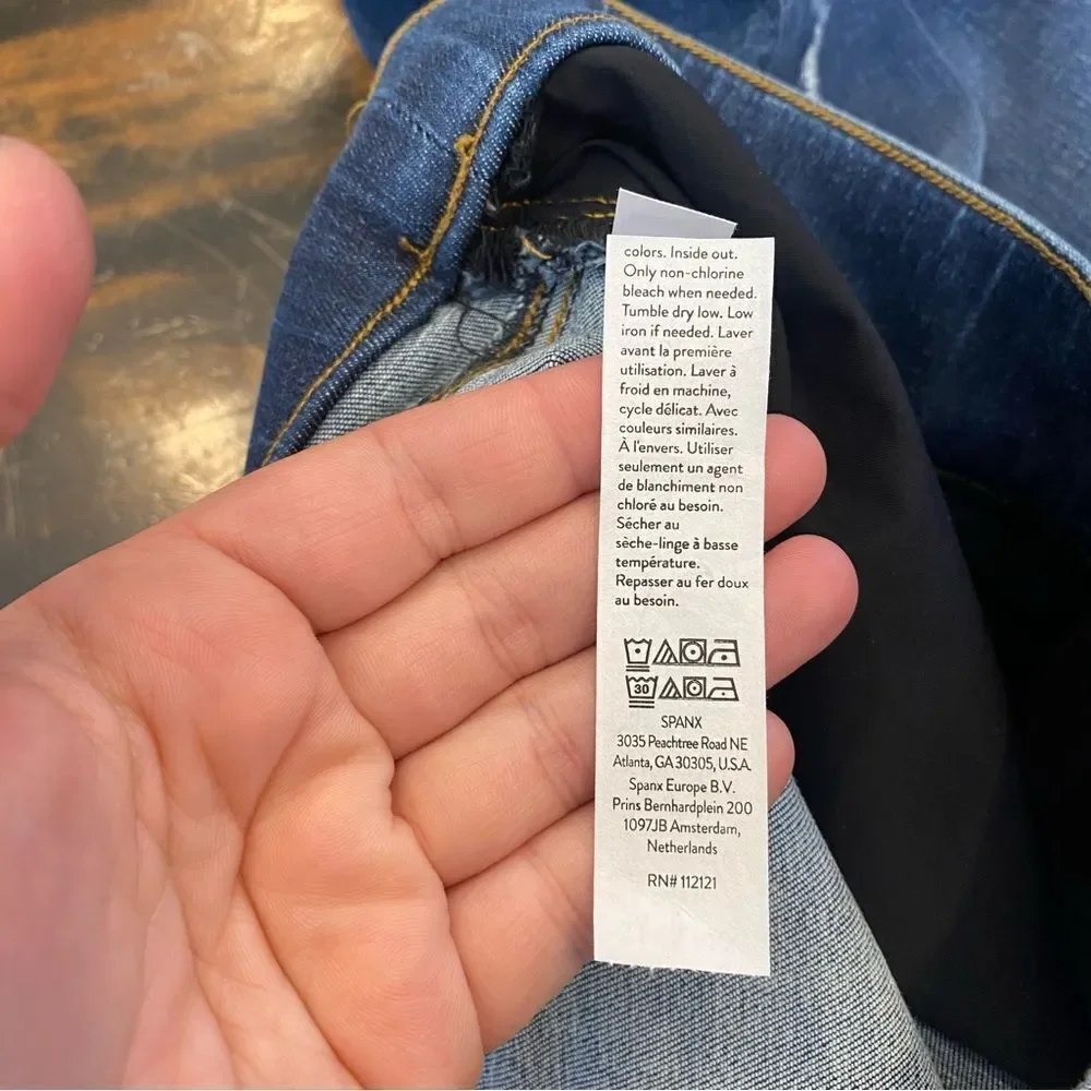 SPANX Petite Distressed Released Raw Hem Skinny Jeans in Medium Wash